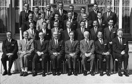 Large group posing outside Cadbury Factory