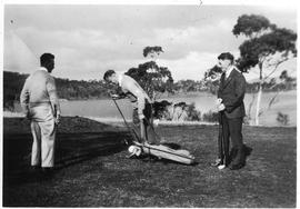 Trio Playing Golf