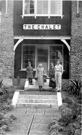 People at the door of The Chalet