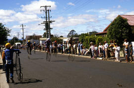 Penny farthing cyclists take a corner