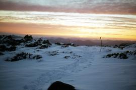 Footsteps in snow at Sunset atop Naturalist Peak, 1973