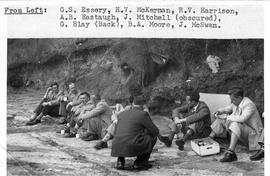 Group seated on ground taking a rest break