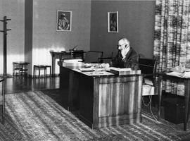 Man seated at desk