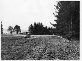 Bulldozer clearing land