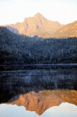 Portrait format view of reflection of Mount Anne on surface of Lake Timk