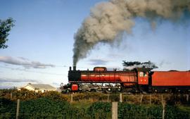 H Class locomotive steams slowly along at Perth