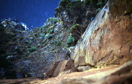 View of shoreline at base of Cape Connella, looking down cliff face