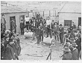 View of woodchoppers Burge and Garcie preparing for competition, Queenstown Tasmania